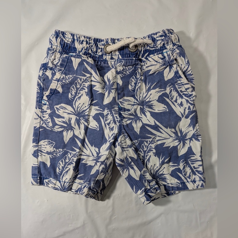 NEXT shorts with a blue and white floral print. Boys Size 5t.